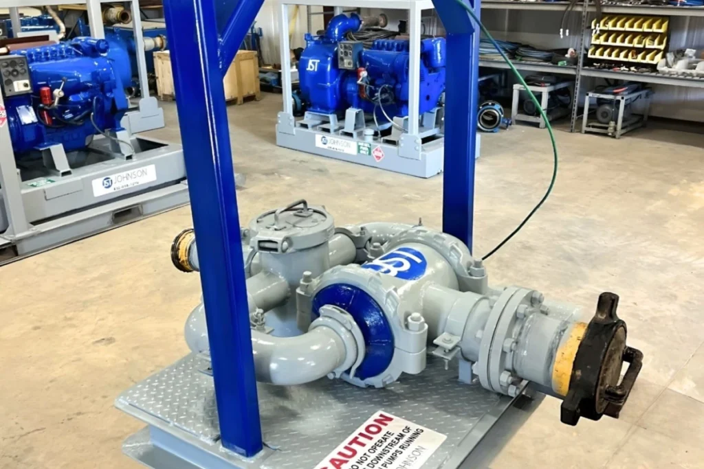 Blue industrial pump and equipment setup